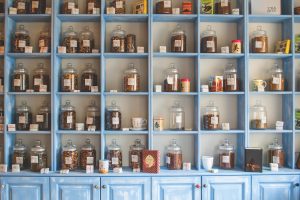 Canva – Assorted Jars on Blue Shelf Cabinets (1)